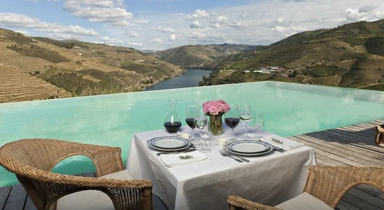 Portugal Travel Guide: Your Complete Guide to Europe's Hidden Gem 11 Enjoying wine by the water at Quinta Do Crasto, Portugal Travel Guide