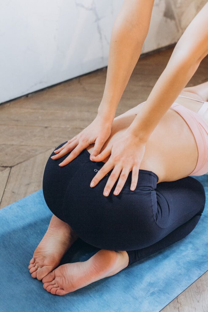 Conquering Lower Back Pain: A Simple 15-Minute Exercise Regimen 4 hands pressing lower back