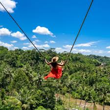 Bali's Hidden Gems: Dive into Paradise and Ignite Your Romance 22 Maya Dewa Canyon Zipline is a 50-m long zipline, located in the middle of the jungle in the Tabanan area. It is the longest waterfall zipline in Bali!