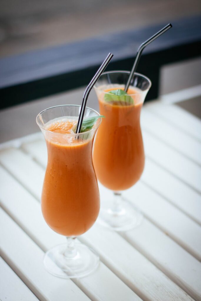 Juice Cleanse Guide: Refresh Your Body & Mind in 2024 47 selective focus photography of two orange drinks