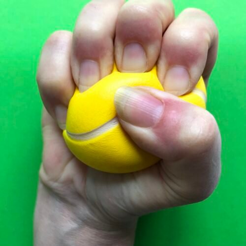 Stress Relief. : Stress ball in a clenched fist