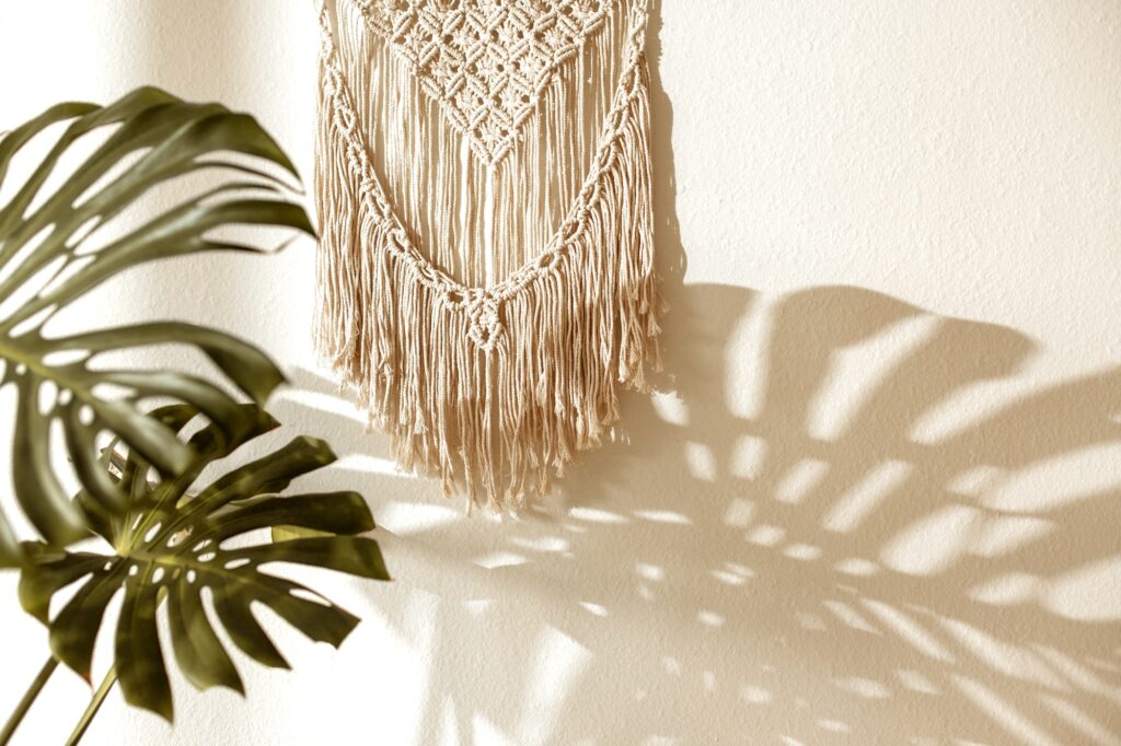 Cozy Bedroom Decor (Gen-Z focus) 2 wall hand made macrame with monstera plant in the room