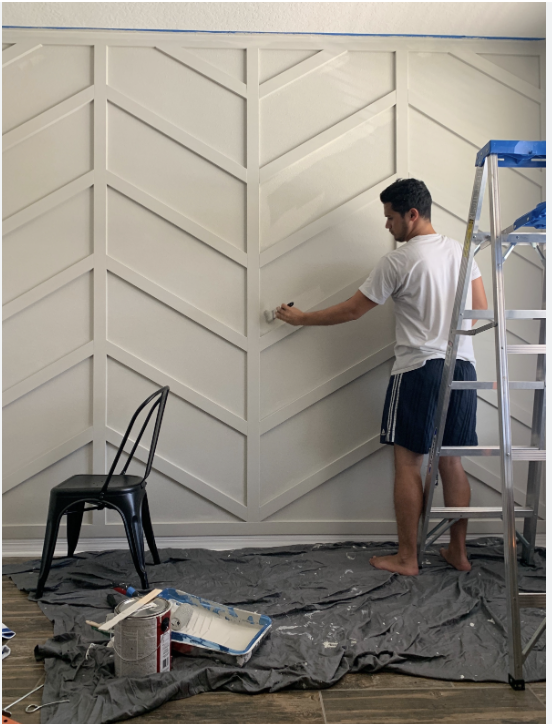 Transform Your Space with Style: A Beginner's Guide to DIY Wall Paneling 2 Different type of Herringbone Design on an accent wall with White paint